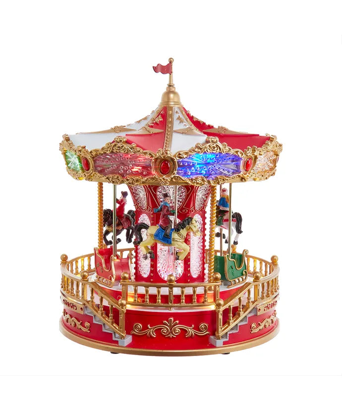 11.1" Battery Operated Multicolor LED Lighted Musical Santa Carousel With Motion Table Piece