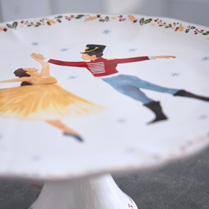 
            
                Load image into Gallery viewer, Nutcracker 13” White Footed Plate - The Nutcracker
            
        